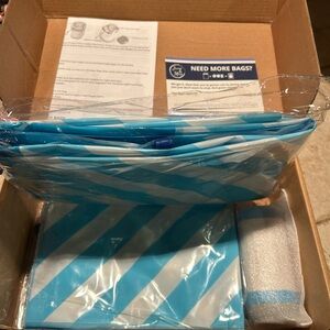 BNIB Clothes Vacuum Sealer Kit